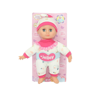 Magic Toys Jelley puha testű 26cm-es baba rózsaszín-fehér mintás ruhában