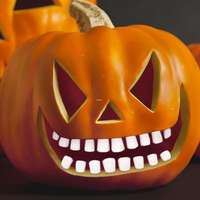 Globiz International Kft. Halloween-i töklámpás fogak - 18 fog / csomag