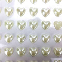 DC Öntapadó szív alakú krém színű félgyöngy 1 cm 77 db/levél