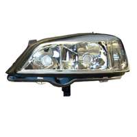 Opel Astra G első fényszóró (bal oldal, elektromos) - TYC (20-5488-08-2)