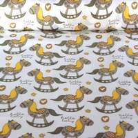 Canvas ROCKY, hintaló mintás pamut vászon anyag, sárga-bézs